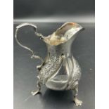 A silver hallmarked milk jug, Birmingham 1911 100g)