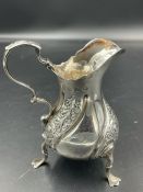 A silver hallmarked milk jug, Birmingham 1911 100g)