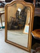 An arched mirror with moulded wooden frame and beading detail (143cm x 102cm)