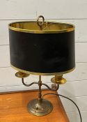 An Empire style brass lamp