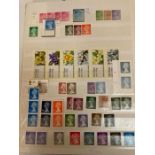 An album of Great Britain stamps, blocks, gutters etc.