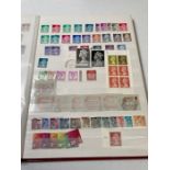 A selection of four Great British stamp albums