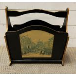 An ebony wooden magazine rack