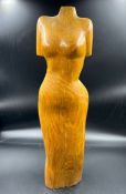 A wooden carving of a women's form 50cm