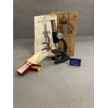 A boxed vintage students microscope