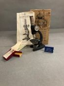 A boxed vintage students microscope