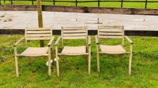 Three wooden and wicker garden chairs