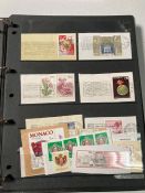 An album of stamps from Monaco on paper
