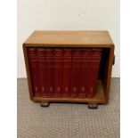 A light oak Art Deco book stand with eight "The book of Knowledge" Waverley