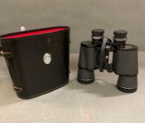 A pair of Falcon 7 x 50 binoculars in case.