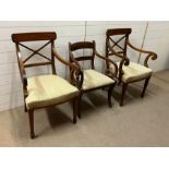 Three William IV style dining chairs with splat backs and scrolling arms