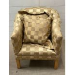 A tub chair with checked upholstery