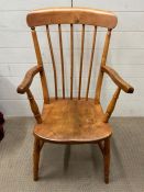 A Windsor chair with spindle back.