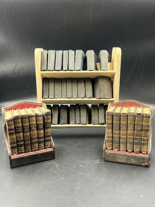 Two miniature book sets of Shakespeare and a miniature book case with books