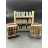 Two miniature book sets of Shakespeare and a miniature book case with books