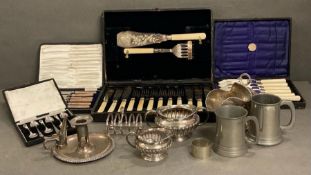 A selection of boxed cutlery sets and some silver plated items.