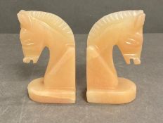 A pair of soapstone horse book ends
