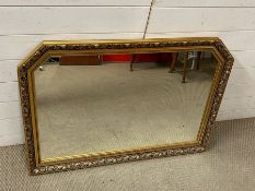 An over mantle mirror with gilt frame
