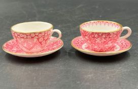 Two miniature Spode bone china cups and saucers