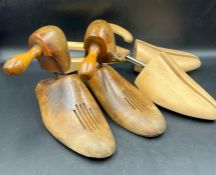 A pair of wooden vintage shoe lasts