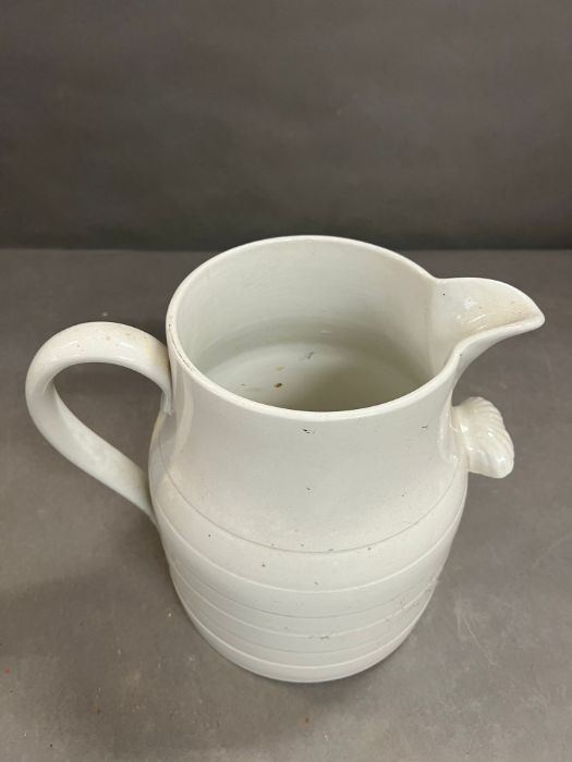 A large white Cornish ware jug (H26cm)