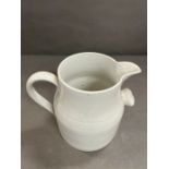 A large white Cornish ware jug (H26cm)