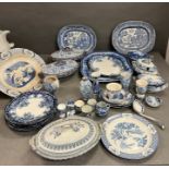 A selection of blue and white china, to include lidded pots, serving platters.
