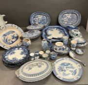 A selection of blue and white china, to include lidded pots, serving platters.
