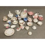 A selection of miniature tea sets etc various makers to include Coalport, Crown Staffs, Wedgwood
