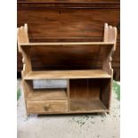 A pine kitchen shelving unit