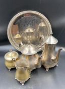A selection of silver plate items, including tray, coffee pot, tea pot, milk jug and sugar bowl