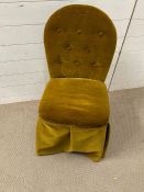 An upholstered side chair