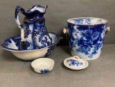 A wash bowl and jug with two pots etc