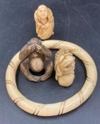 Antique ivory netsukes , a 'See no Evil' monkey and a bracelet
