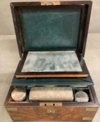 A Mid 19th Century brass cornered box with cut glass and white metal lids, and grooming items from