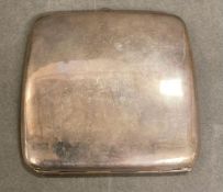 A silver cigarette case hallmarked for Birmingham