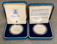 Two silver proof coins commemorating the marriage of Charles and Diana