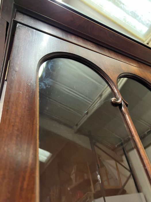 A mahogany glazed bookcase with cupboard under (Base H95cm W110cm D38cm Top H145cm W104cm D33cm) - Image 4 of 5