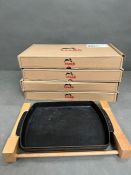 Four Staub en Alsace French cookware Brasserie plates with wooden base