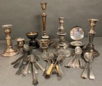 A selection of silver plated items to include candlesticks