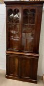 A mahogany glazed bookcase with cupboard under (Base H95cm W110cm D38cm Top H145cm W104cm D33cm)