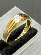 An 18ct yellow gold diamond Gypsy set style ring 8 claws approx total weight 6g. Diamond aapprox