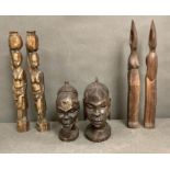 Four carved African wooden figures and two busts
