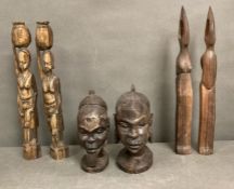 Four carved African wooden figures and two busts