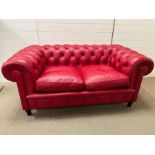 A Poltrona Frau Chesterfield sofa in red.H70 x D84 x L158cm