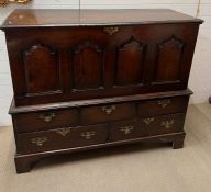 A late 18th century Welsh oak coffer on a five drawer stand from Carmarthenshire C1780, lid made