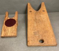 Two wooden boot jacks