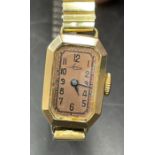 A 9ct gold Avia ladies gold watch on replacement bracelet.