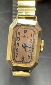 A 9ct gold Avia ladies gold watch on replacement bracelet.