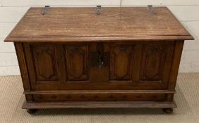 An oak blanket box on bun feet AF (H104cm W102cm D78cm)